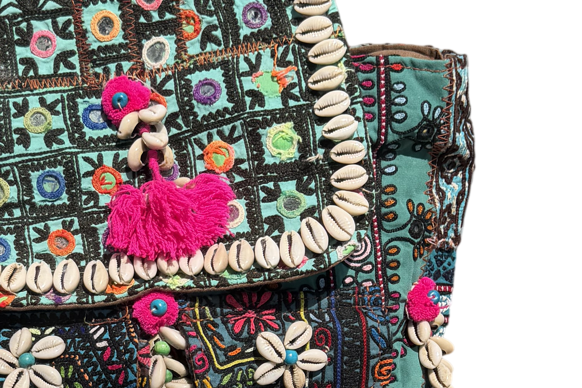Shell Tassel Handcrafted Backpack — Peacock Trail