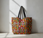 Model walking with Jat Mutava red geometric Suf tote bag — lifestyle shot