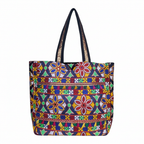 Model carrying Jat Mutava rangoli Suf tote bag — boho style