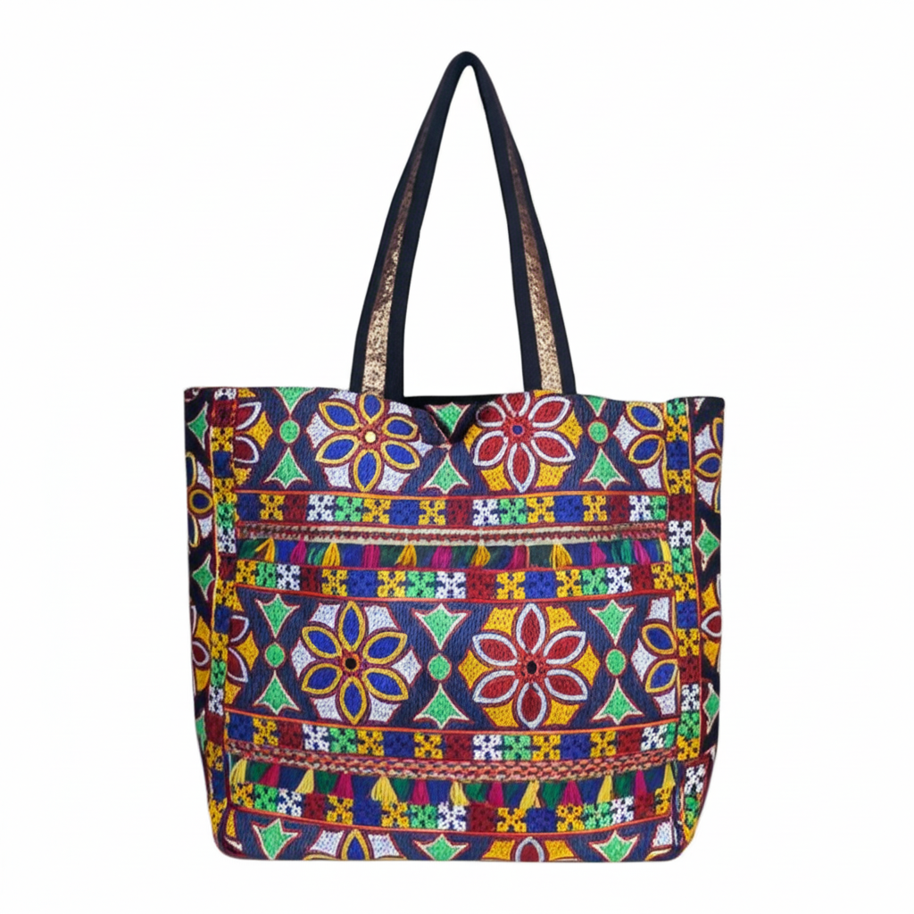 Model carrying Jat Mutava rangoli Suf tote bag — boho style