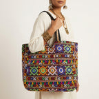 Model carrying Jat Mutava blue diamond Suf tote bag — boho style