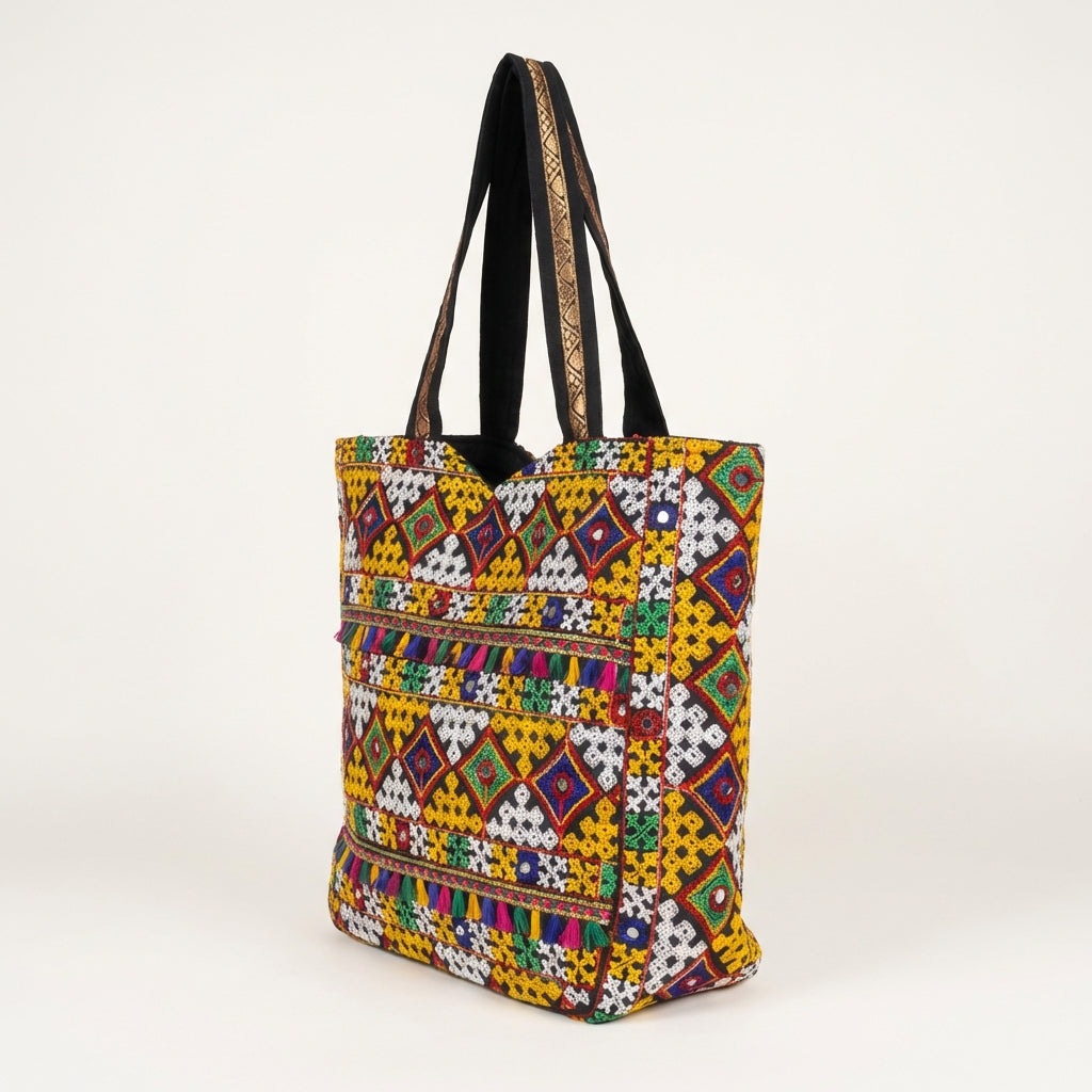 Model carrying Jat Mutava yellow white diamond Suf tote bag — boho style