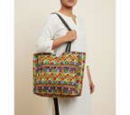 Model carrying Jat Mutava red yellow leaf Suf tote bag — boho style
