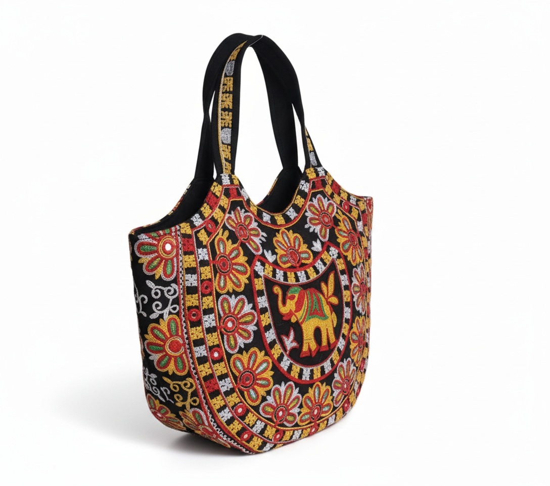 Rabari embroidery black elephant tote bag side view showing depth