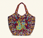 Rabari embroidery maroon dandiya tote bag side view showing depth