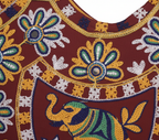 Model carrying Rabari embroidery red elephant yellow accent tote bag — boho style