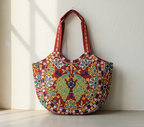Rabari embroidery red peacock tote bag isometric angle