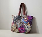 Model walking with Applique Patchwork Charcoal Mosaic tote bag — lifestyle shot