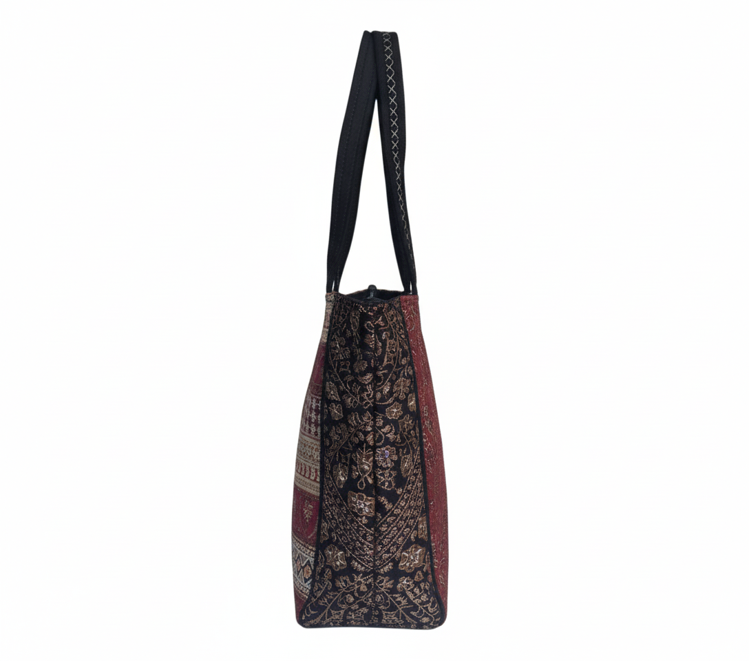 Close-up of Noir Shimmer gotta patchwork metallic detail on tote bag