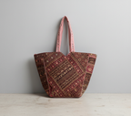 Close-up of Rose Shimmer gotta patchwork metallic detail on tote bag