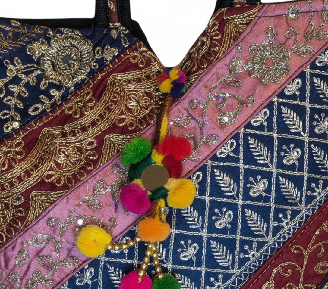 Gotta Patti Mirror Tassel Midnight Radiance tote bag side view showing depth