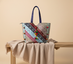 Model carrying Gotta Patti Mirror Tassel Indigo Radiance tote bag — boho style