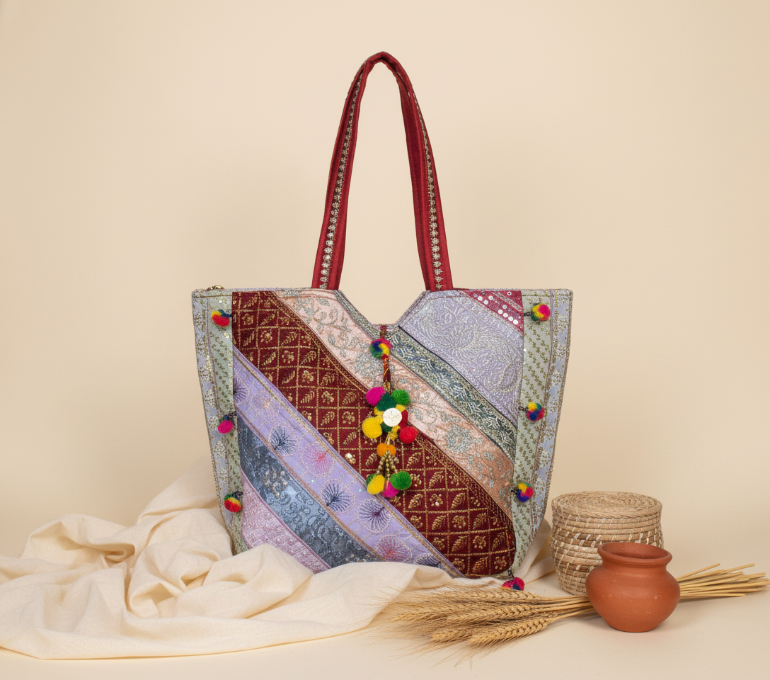 Gotta Patti Mirror Tassel Scarlet Gleam tote bag side view showing depth