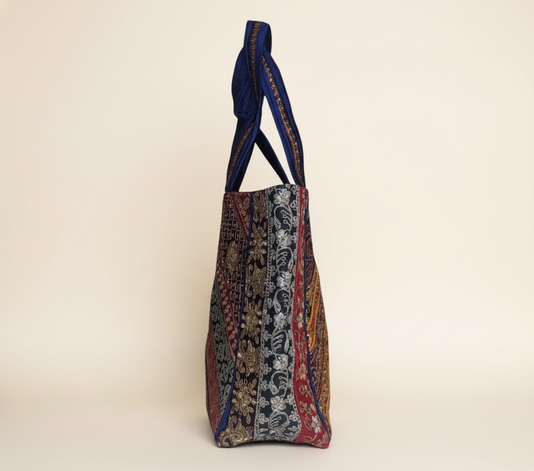 Model carrying Gotta Patti No Tassel Sapphire Elegance tote bag — boho style