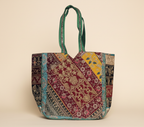 Model walking with Gotta Patti No Tassel Emerald Elegance tote bag — lifestyle shot