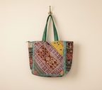 Gotta Patti No Tassel Emerald Elegance tote bag flatlay composition