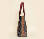 Close-up of Wine Elegance gotta patti ribbon detail on tote bag