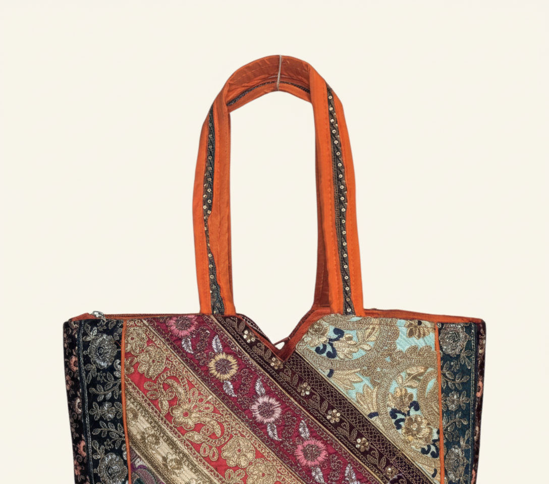Close-up of Amber Elegance gotta patti ribbon detail on tote bag