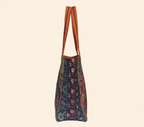 Model walking with Gotta Patti No Tassel Amber Elegance tote bag — lifestyle shot