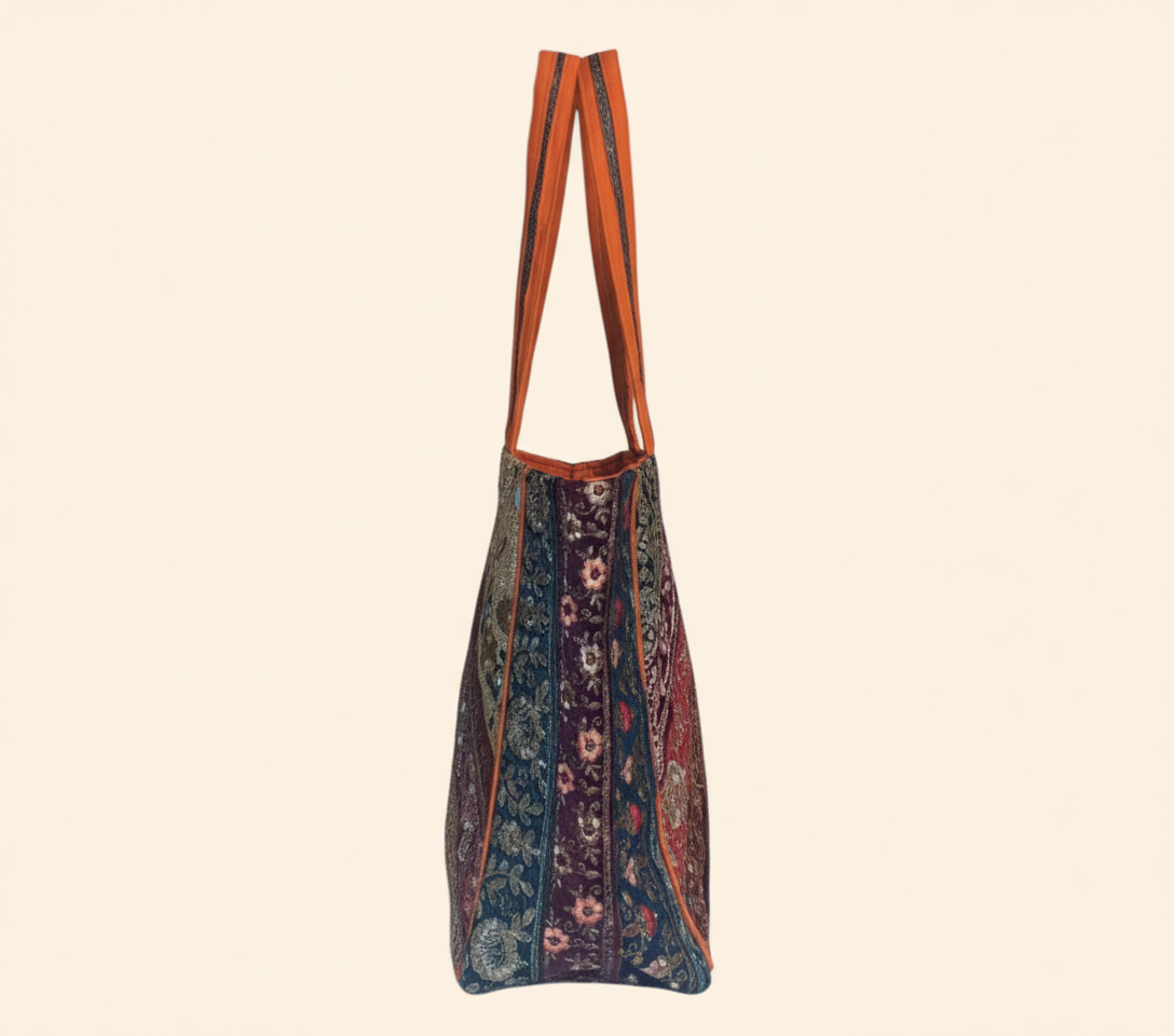 Model walking with Gotta Patti No Tassel Amber Elegance tote bag — lifestyle shot