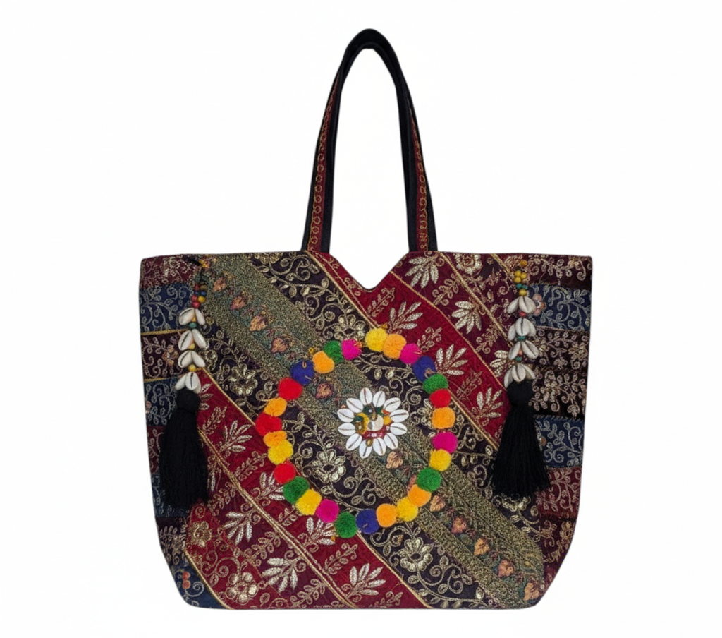 Gotta Patti Shell Tassel Crimson Festival tote bag cowrie shell medallion detail