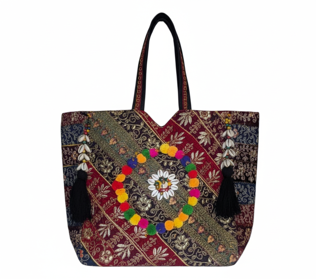 Gotta Patti Shell Tassel Crimson Festival tote bag cowrie shell medallion detail