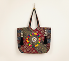 Model walking with Gotta Patti Shell Tassel Crimson Festival tote bag — lifestyle shot