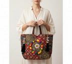 Gotta Patti Shell Tassel Crimson Festival tote bag styled on hook — Mystic Dhaga