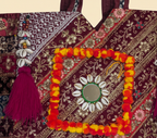 Close-up of Wine Festival gotta patti ribbon and shell tassel detail