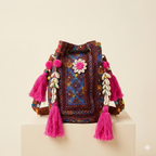 Close-up of Indigo Dahlia cowrie shell & tassel detail