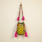Shell Tassel Citrus Bloom (Medium) bucket bag side view showing depth