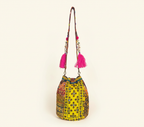 Model carrying Shell Tassel Citrus Bloom (Medium) bucket bag — boho style