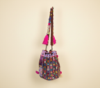 Model carrying Shell Tassel Lilac Prism (Medium) bucket bag — boho style