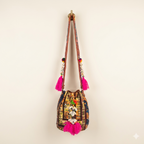 Shell Tassel Amber Heirloom (Mini) bucket bag side view showing depth