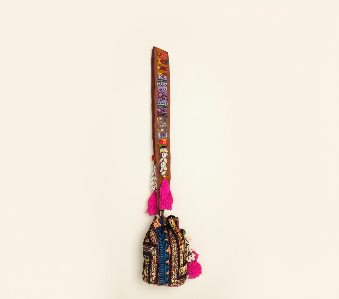 Shell Tassel Amber Heirloom (Mini) bucket bag isometric angle