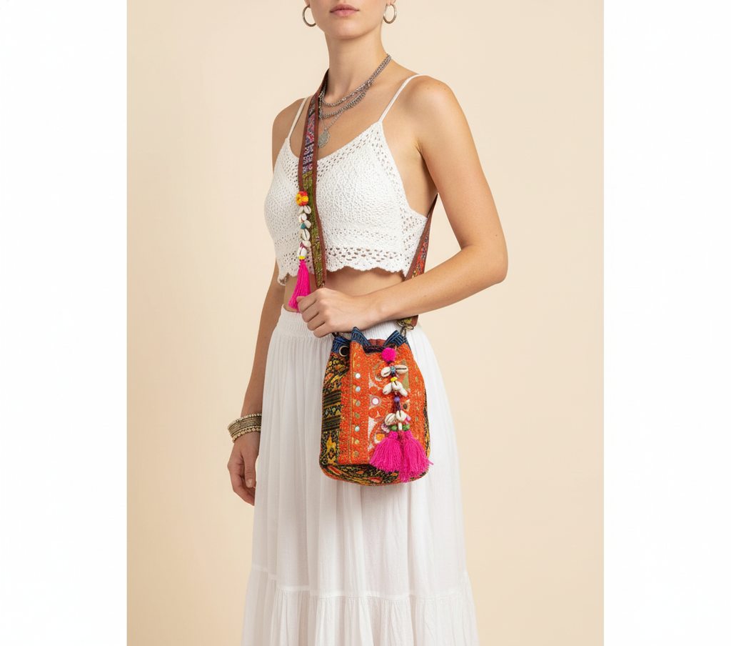 Shell Tassel Tangerine Spark (Mini) bucket bag front view — Mystic Dhaga