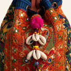 Shell Tassel Tangerine Spark (Mini) bucket bag back view