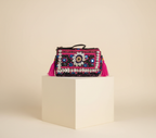 Shell Tassel Kajariya crossbody bag side view showing depth