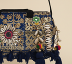 Shell Tassel Neel Leher crossbody bag side view showing depth