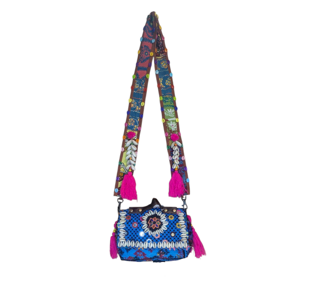 Shell Tassel Neel Mani crossbody bag side view showing depth