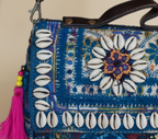Shell Tassel Meenakari crossbody bag isometric angle
