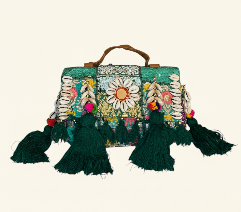 Shell Tassel Panna crossbody bag side view showing depth