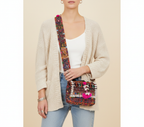 Shell Tassel Dhamaal crossbody bag side view showing depth