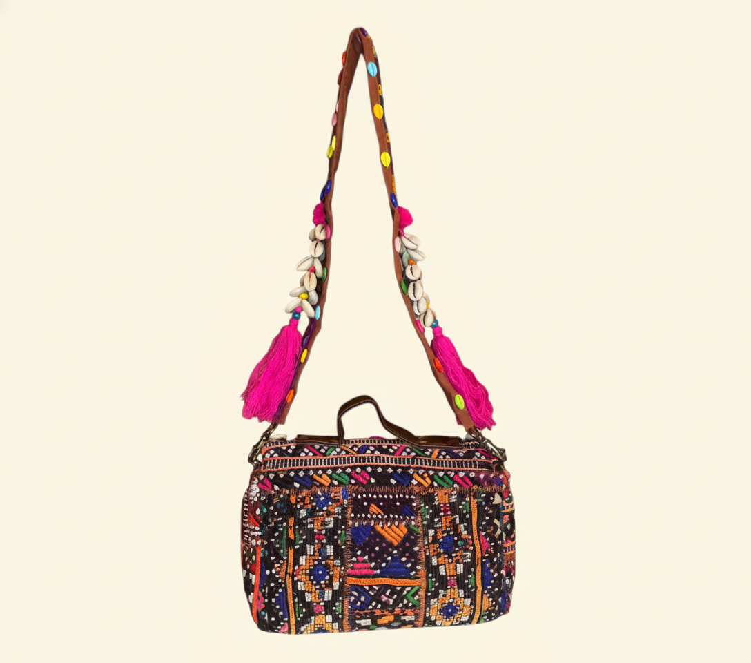 Close-up of Banjara cowrie shell & tassel detail