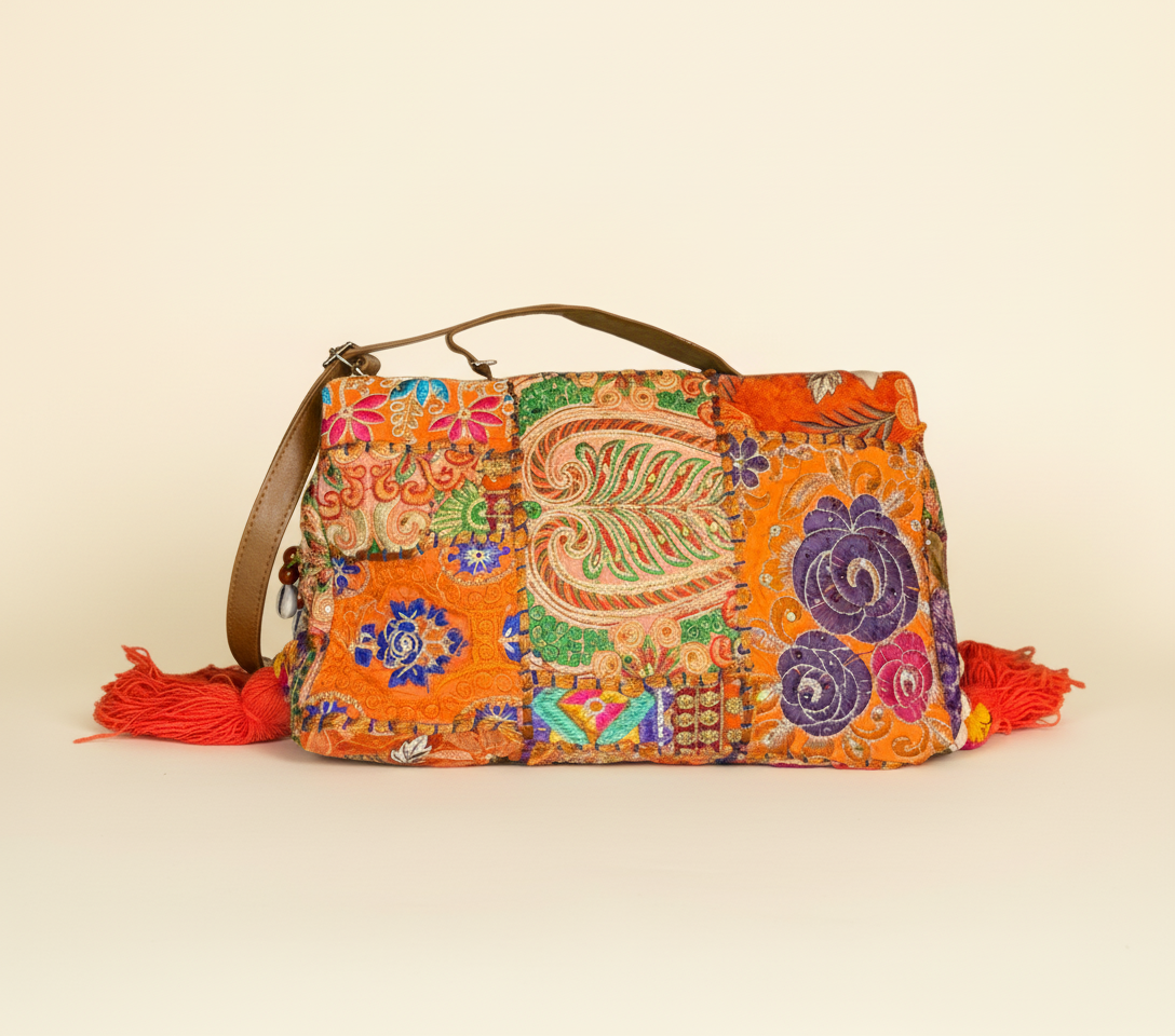 Model carrying Shell Tassel Sandhya crossbody bag — boho style