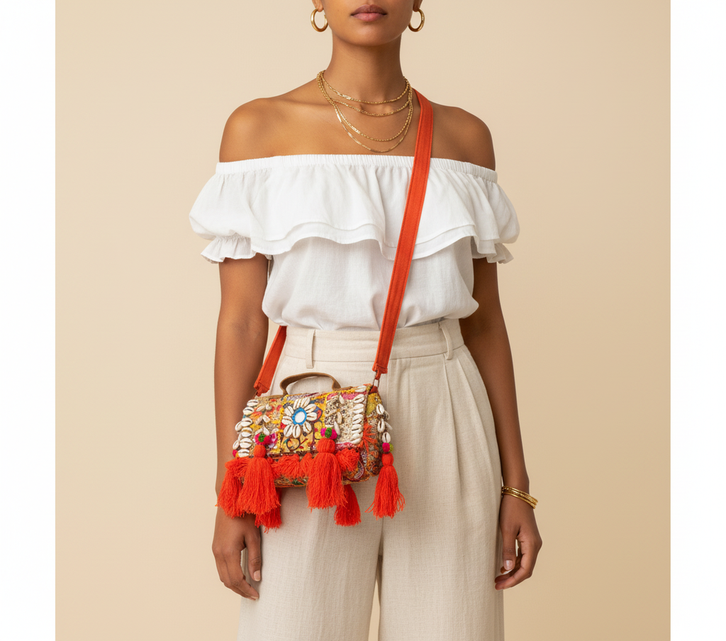 Model walking with Shell Tassel Moonga crossbody bag — lifestyle shot
