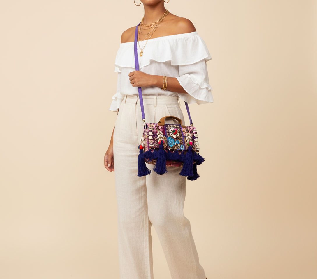 Shell Tassel Jamuni crossbody bag side view showing depth
