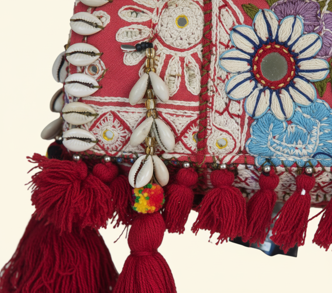 Shell Tassel Tambra crossbody bag side view showing depth