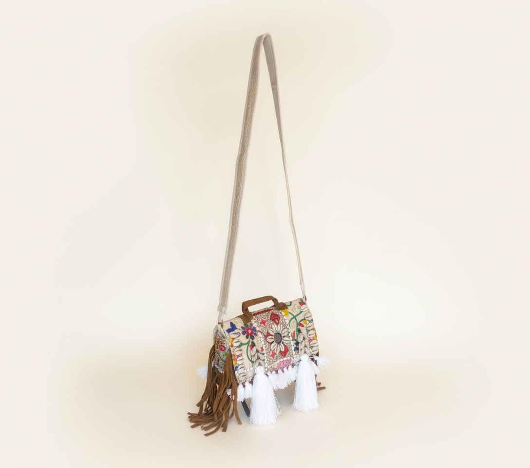 Shell Tassel Shubhra crossbody bag side view showing depth
