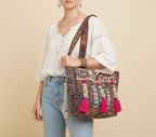 Model carrying Shell Tassel Amber Mosaic tote bag — boho style